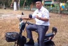 Hemat BBM, Camat Ulu Manna Ngantor Pakai Sepeda Listrik